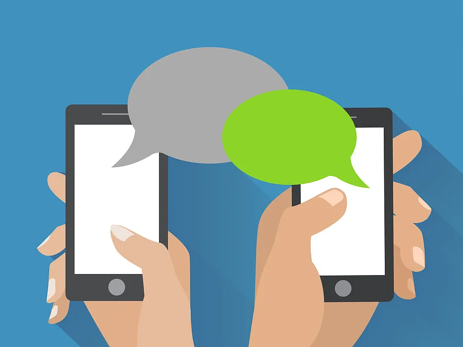 Cartoon of two hands holding mobile phones and messaging each other
